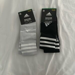 2 pairs grey and black soccer socks